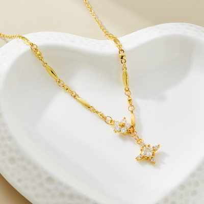 HEAVENLY CROSS NECKLACE
